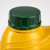 Close-up of dark green tamper-evident cap on yellow Caluanie Muelear Oxidize container
